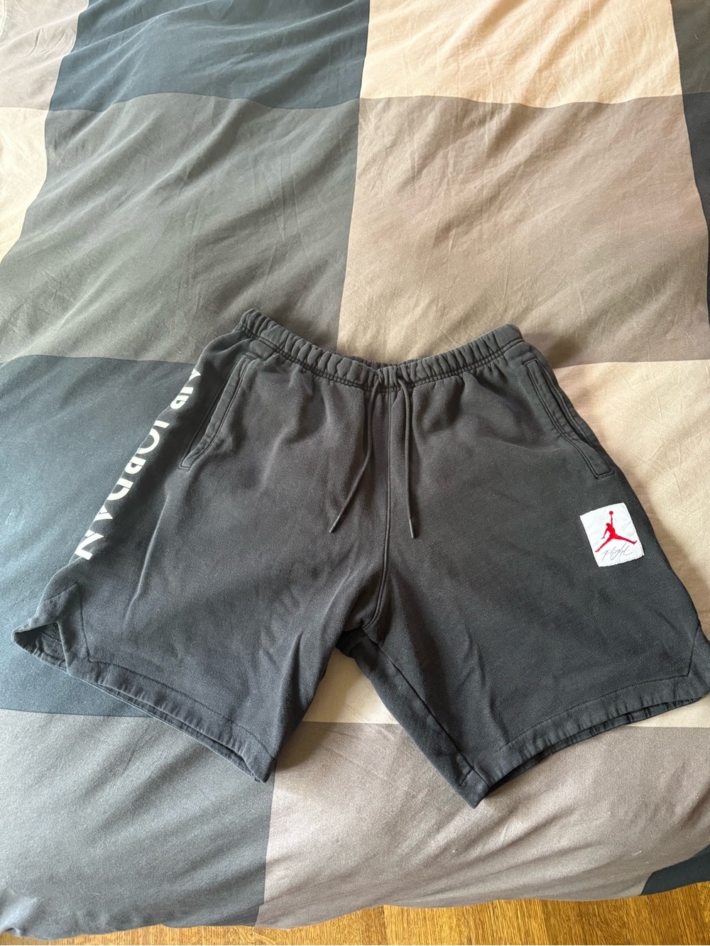 Jordan Men’s Black Athletic Shorts with Red Jumpman Patch